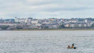 A small fishing boat leaving the Port of Howth, Dublin