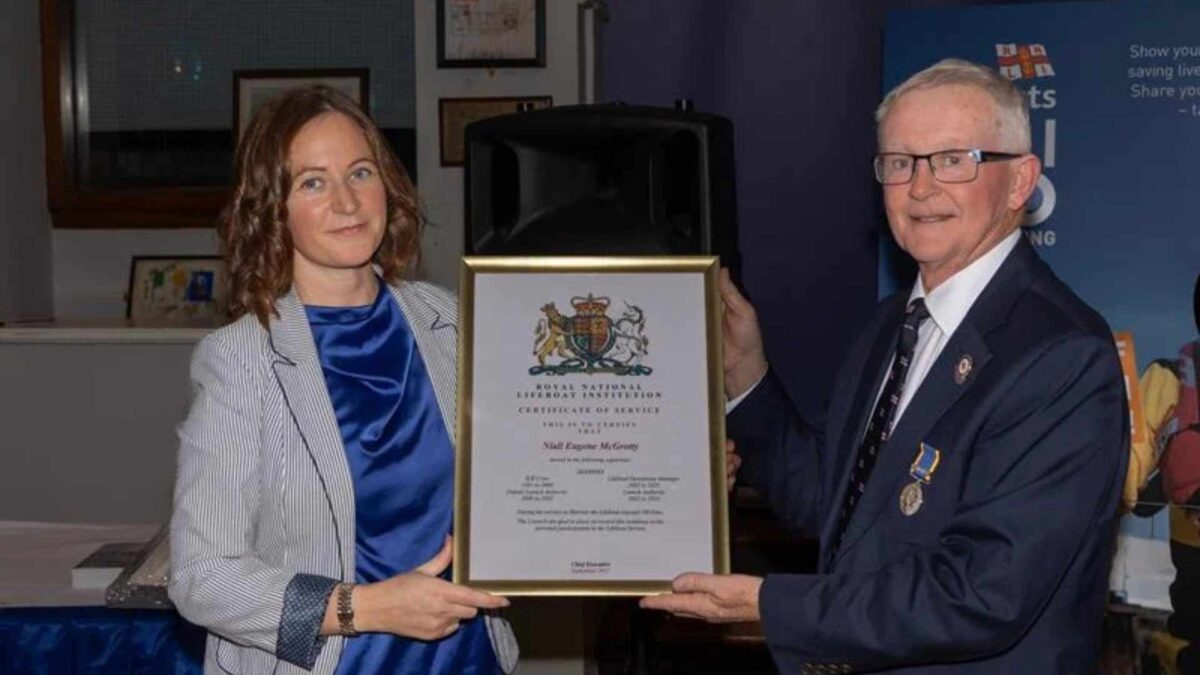 Area-operations-manager-Lisa-Hollingum-presenting-Niall-McGrotty-with-his-certificate-of-service.--1200x675 End of an Era at the Helm in Skerries RNLI