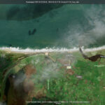 Satellite Captures Ireland's Autumn Colours, Showery Skies and Rugged Coastline 1 waves breaking onto the beach near Portstewart in Co Derry.